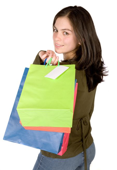 beautiful girl with shopping bags over white