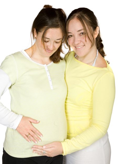 pregnant woman and her sister over white