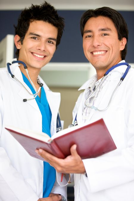 doctors in a hospital looking at an agenda