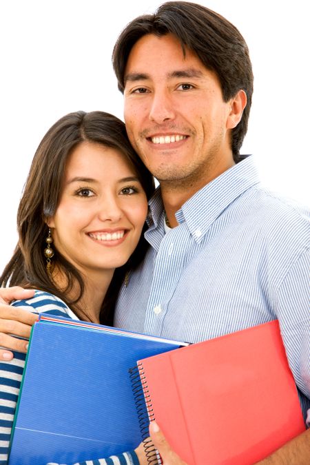 couple of young students smiling - isolated over a white background