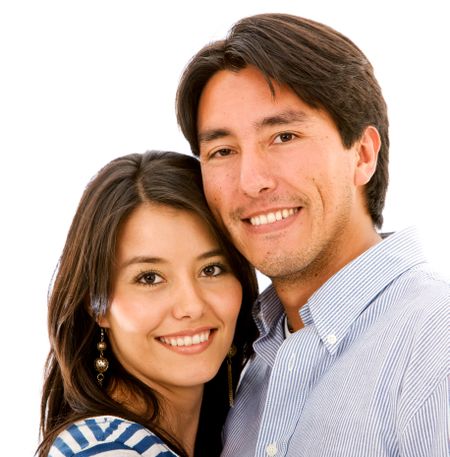 family portrait of a brother and sister smiling isolated over a white background