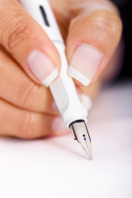 business hand and pen signing a contract