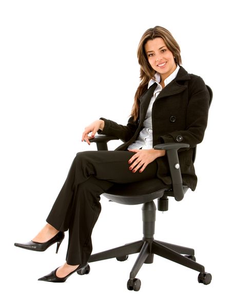 business woman sitting on a chair isolated over white