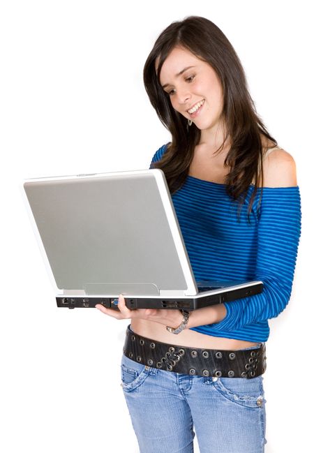 beautiful girl browsing on a laptop over white