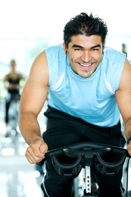 man smiling while in a gym