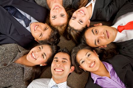 business people teamwork in an office with heads together