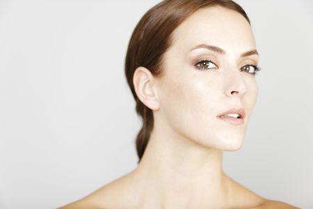 Beautiful young woman in a beauty style pose