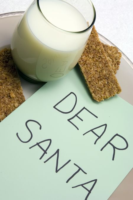 Glass of milk, three granola bars, and note to Santa Claus on dinner plate