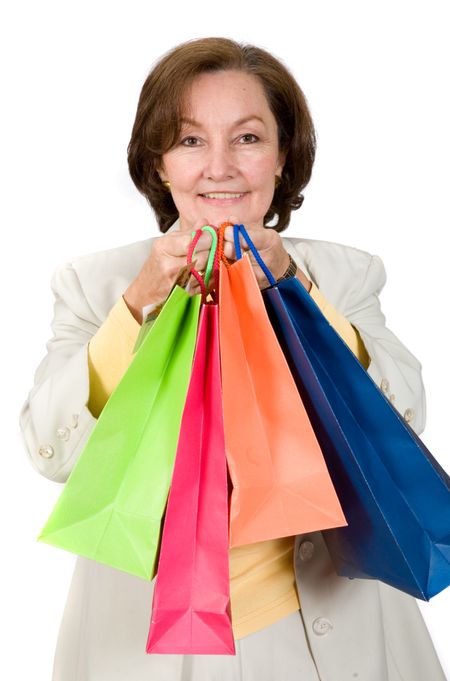 business woman with shopping bags over white