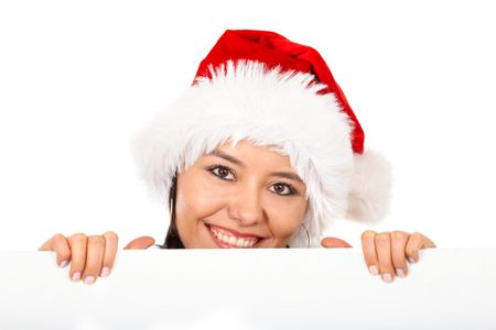 Female santa holding a christmas white card - isolated over a white background