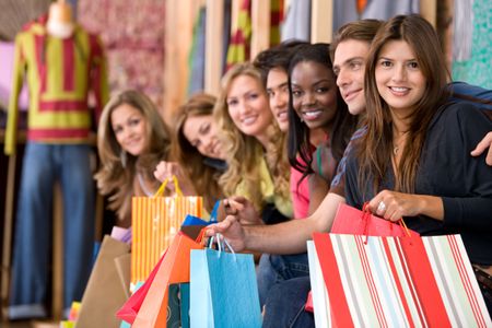 group of friends shopping in a retail store