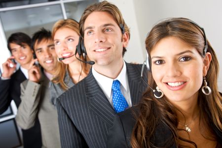 business customer service woman smiling with her team behind