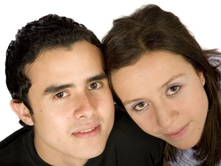 casual couple with a serene and hopeful look over white