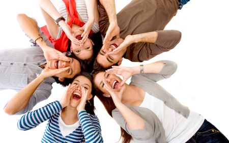 Friends shouting on the floor with their heads together isolated over a white background