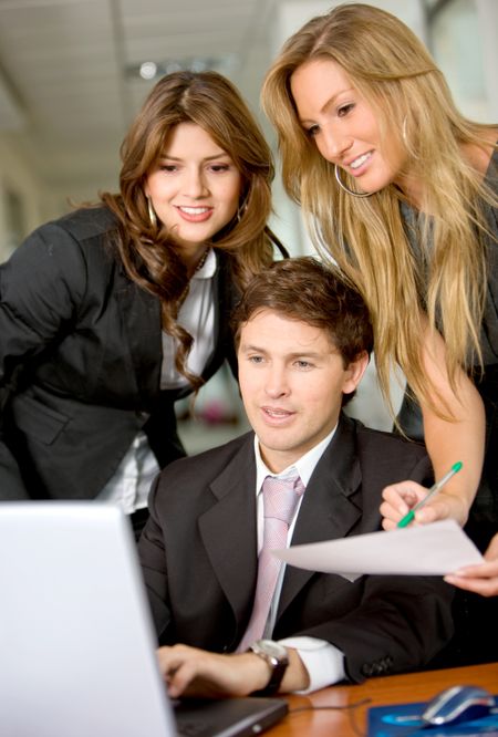 business team in a meeting on a laptop computer