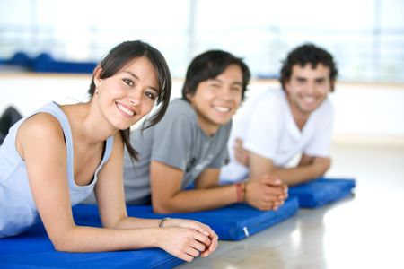 group of people at the gym smiling