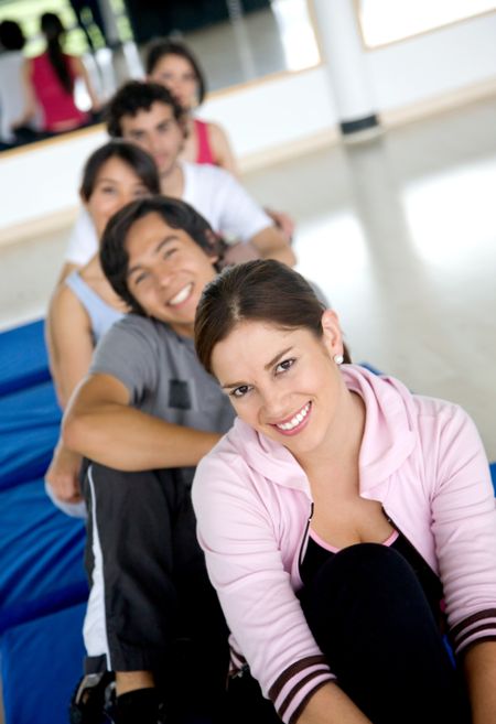 group of people at the gym smiling