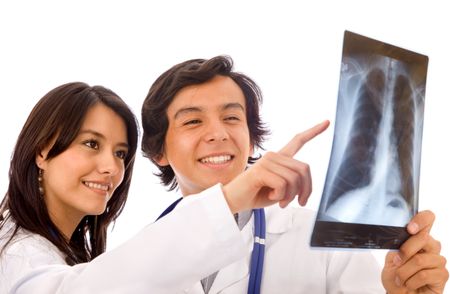 couple of doctor watching an xray over a white background