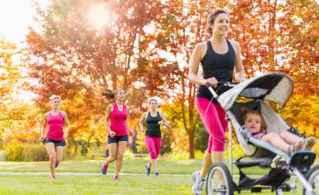 Mother and friends jogging