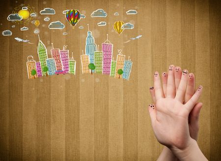 Happy cheerful smiley fingers looking at colorful handrawn cityscape