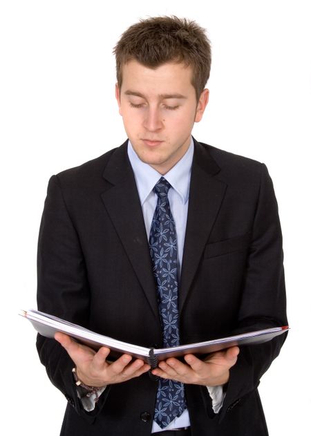 business man reading a book over a white background