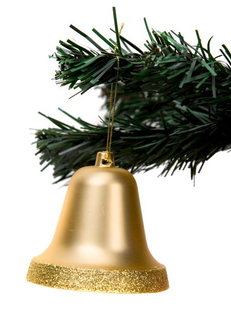 gold christmas bell over a white background