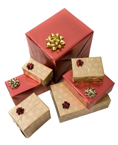 gifts in gold and red over a white background seen from a high angle