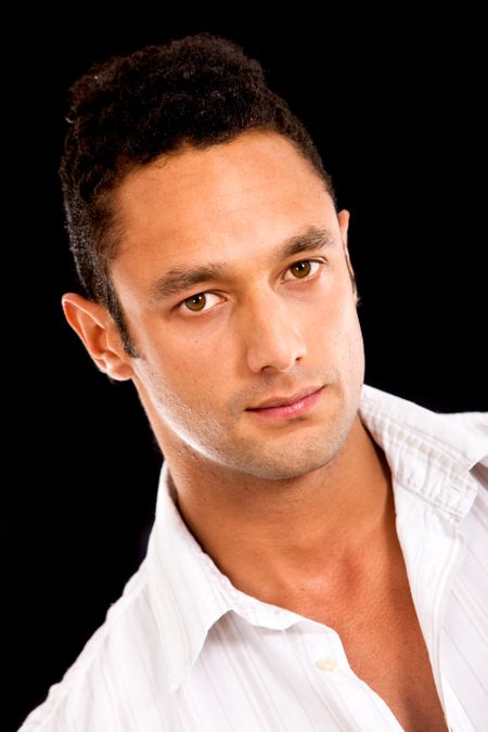 fashion man portrait isolated over a black background