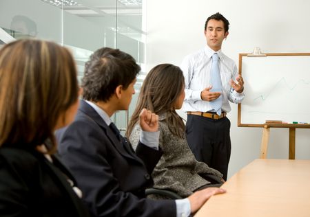 business man doing a presentation in an office