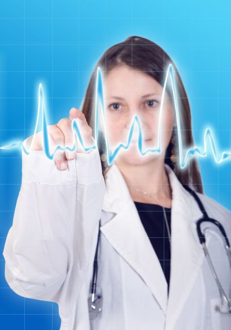 female doctor checking the heartbeat of a patient on a graph