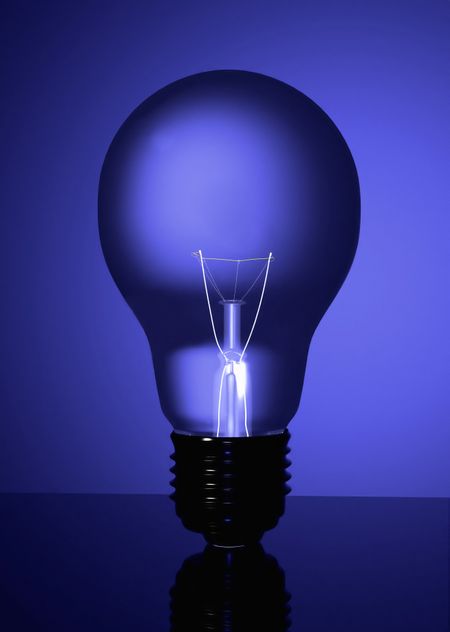 blue lightbulb in blue colours made in 3d