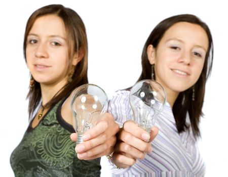 sisters holding lightbulbs over a white background