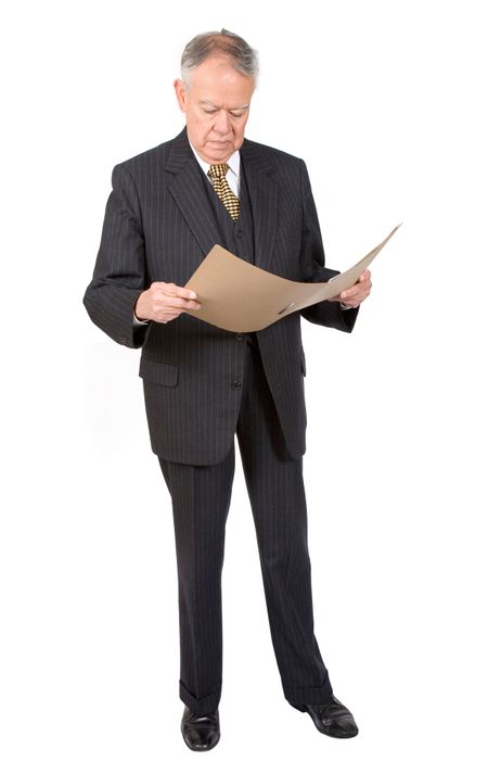 business man reading a report over white