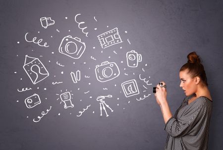 Young photographer girl shooting photography icons