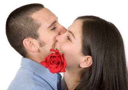 beautiful couple in love with a rose over white