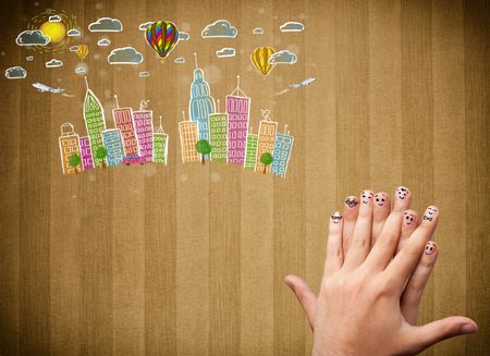 Happy cheerful smiley fingers looking at colorful handrawn cityscape