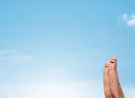 Happy cheerful smiley fingers looking at clear blue sky copyspace