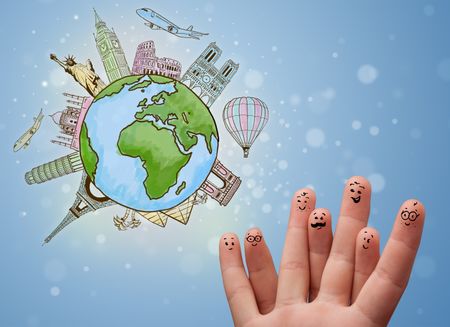 Cheerful happy smiling fingers with famous landmarks of the globe