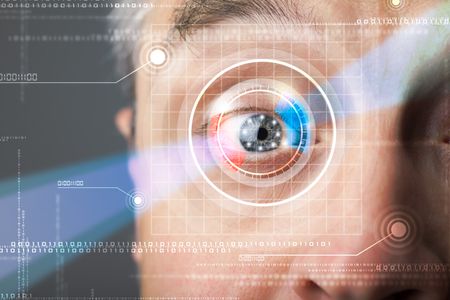 Modern cyber man with technolgy eye looking