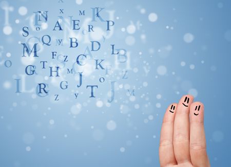 Happy cheerful smiley fingers looking at mixture of bokeh letters