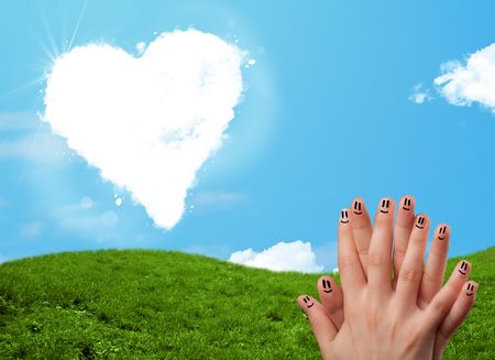 Happy cheerful smiley fingers looking at heart shaped cloud