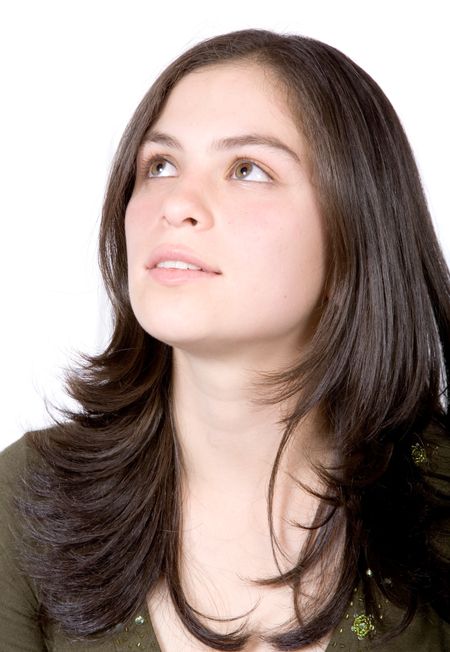 beautiful woman portrait showing her in a pensive mood over a white background