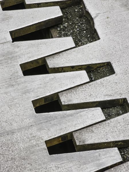 Part of an expansion joint (which can absorb heat-induced expansion and allow movement in an earthquake) between sections of a large bridge in Mount Rainier National Park, Washington, USA