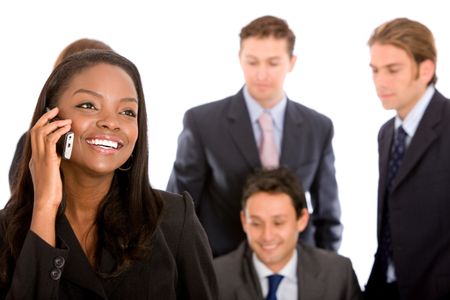 business woman on the phone with her team behind isolated