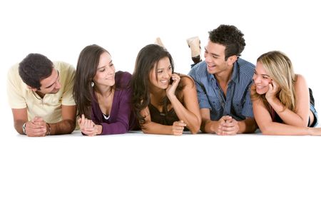 Group of casual people lying on the floor isolated over a white background