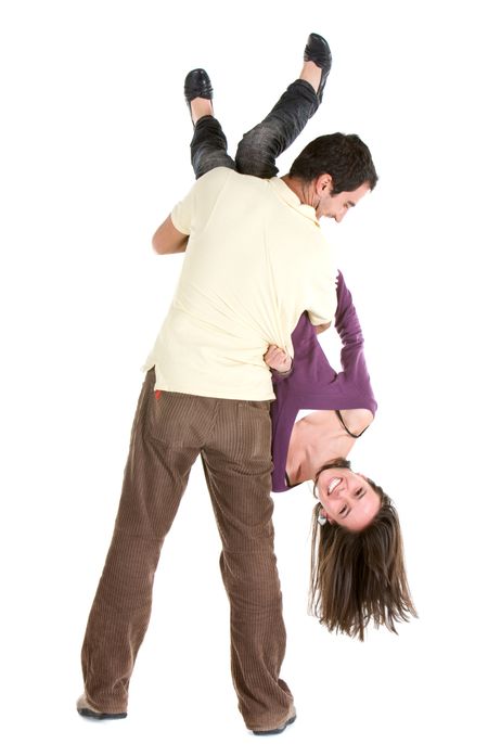 Man carrying a woman upside down isolated over white