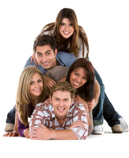 Happy group of friends on the floor isolated over a white background