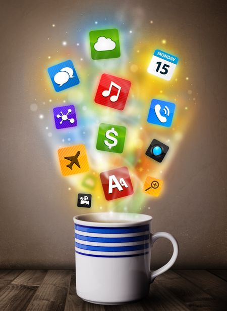Coffee mug with colorful media icons, close up