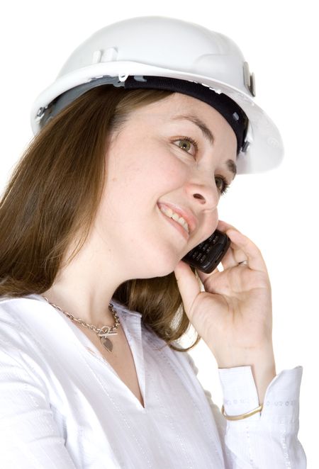 female architect on a mobile phone over a white background