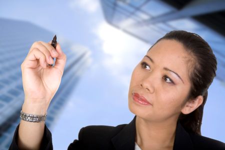 asian business woman writing on screen with a corporate background